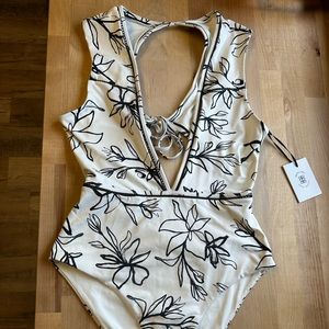 Revel Rey size large one piece NWT